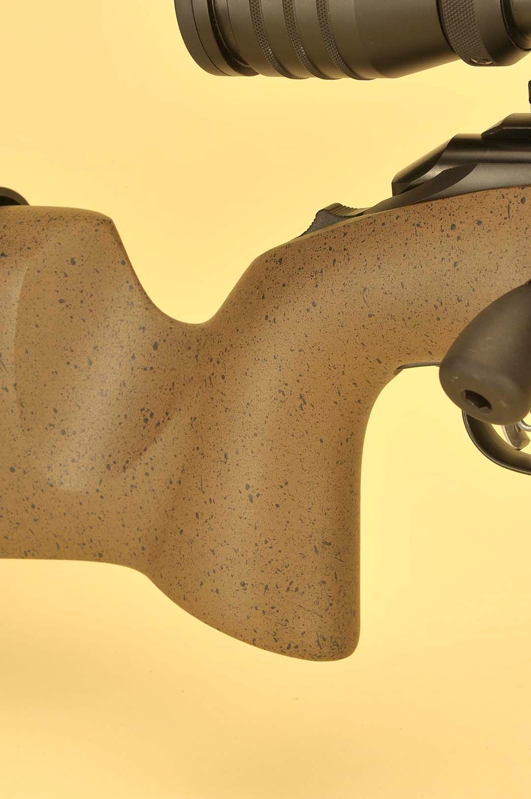 The pistol grip is sharp, but comfortable to shoot regardless of your shooting position. There is a moderate swell on both sides and a wide flair behind it for positioning the hand for shot after shot repeatability downrange.
